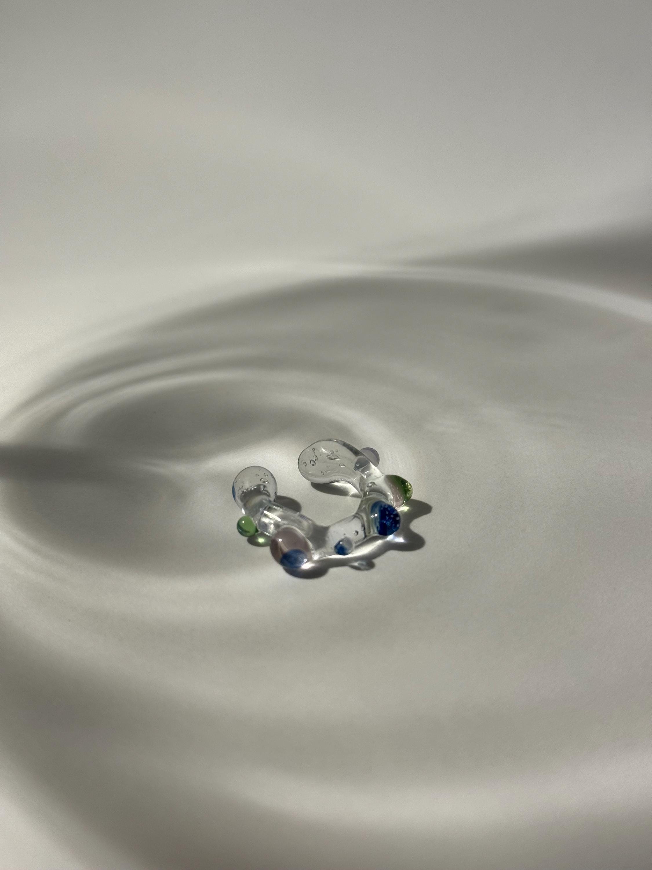 Playfully bubbly Glass Earcuff